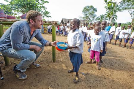 Gerard Butler with Village Children